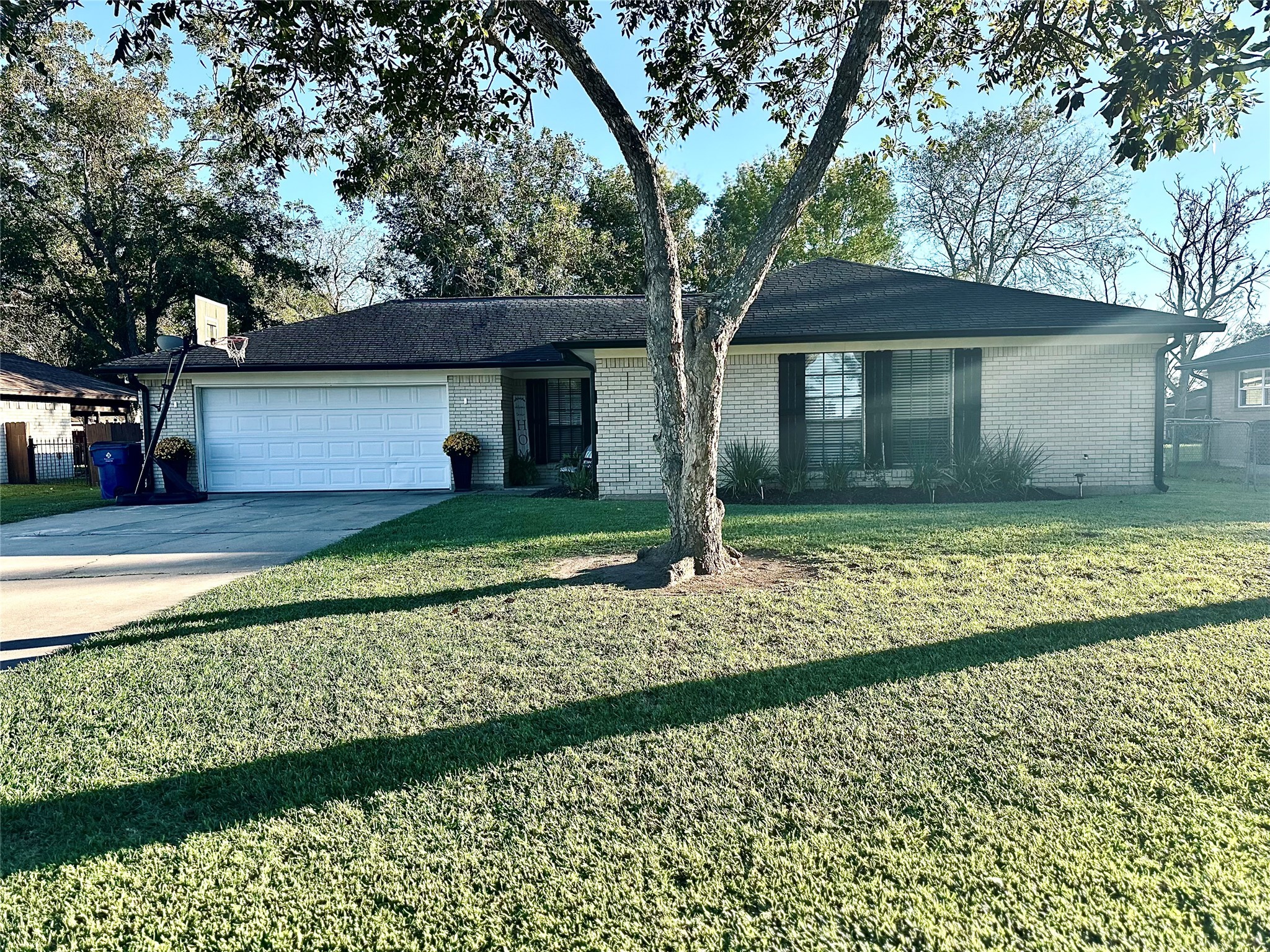 1457 Camellia Street Sweeny, TX 77480 - Photo 4 of 34 a front view of a house with a yard