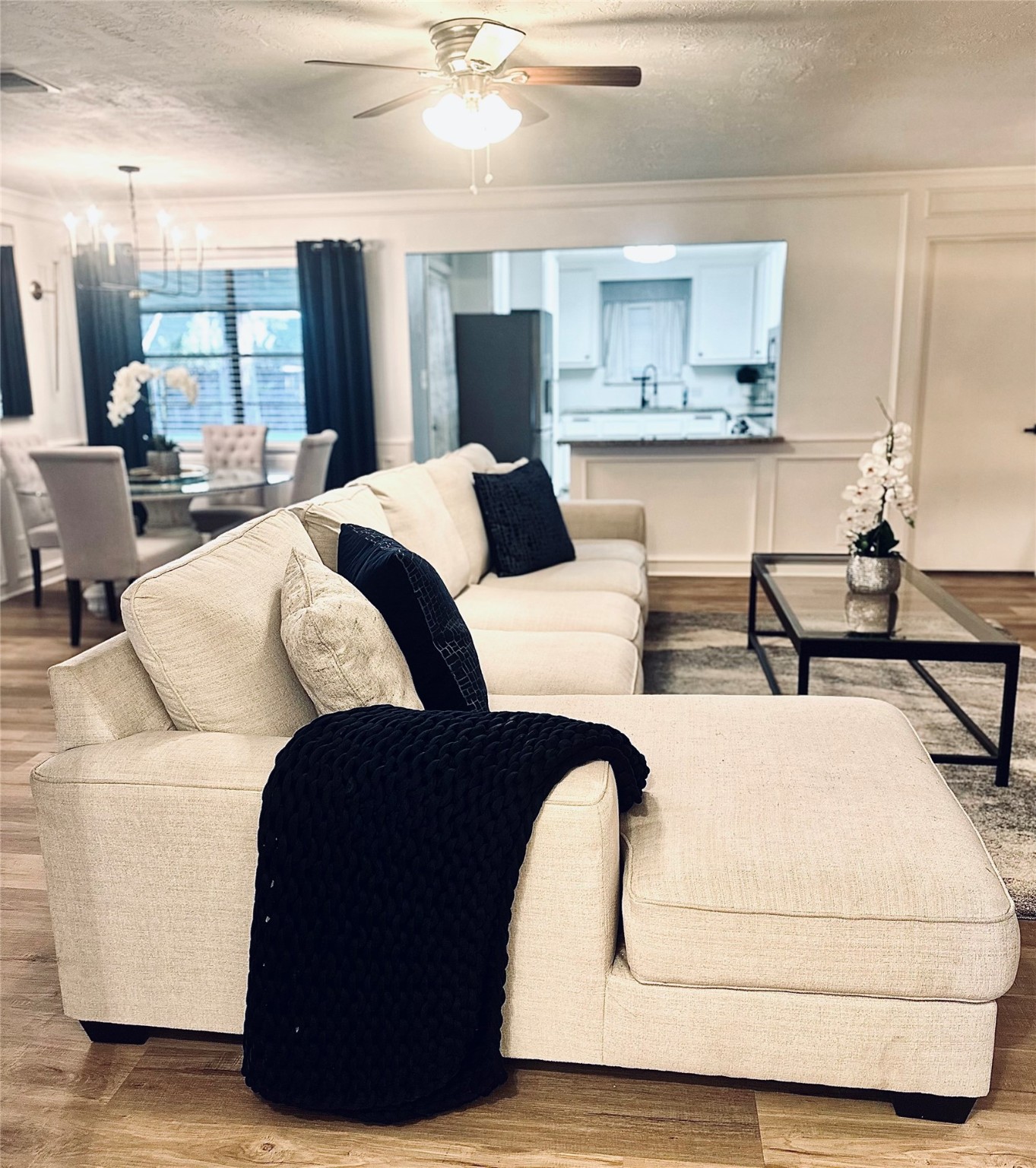 1457 Camellia Street Sweeny, TX 77480 - Photo 7 of 34 a living room with kitchen island furniture and a wooden floor