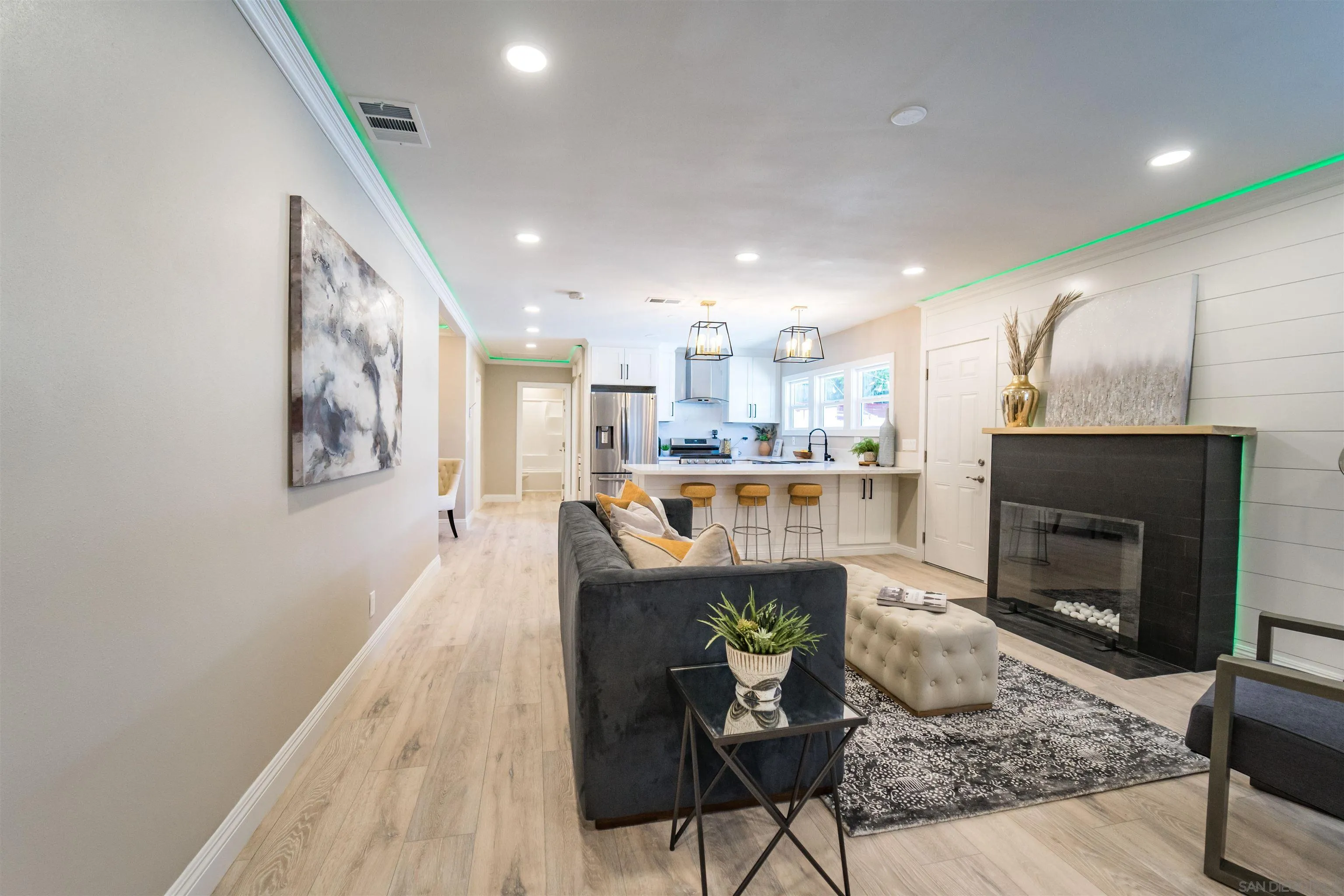 3752 Harris Street La Mesa, CA 91941 - Photo 8 of 24 a living room with furniture and a fireplace