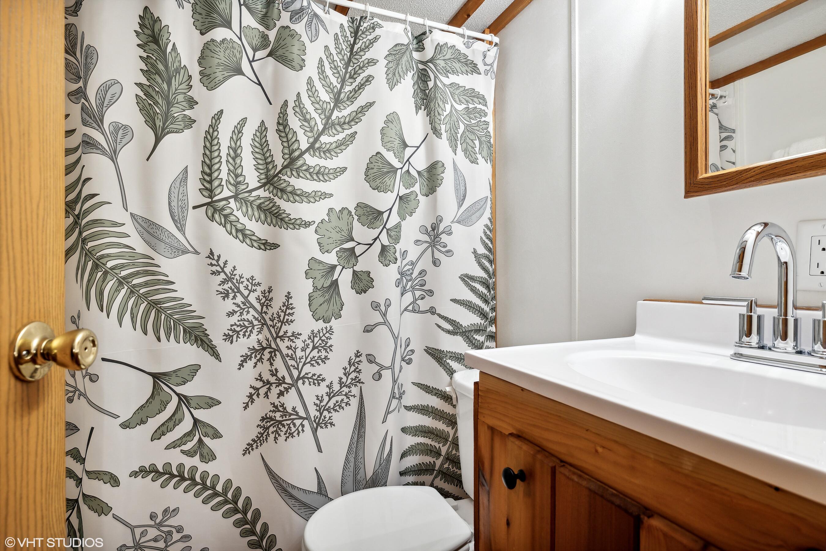 53 Tryon Farm Lane Michigan City, IN 46360 - Photo 12 of 30 a bathroom with a sink and mirror with toilet