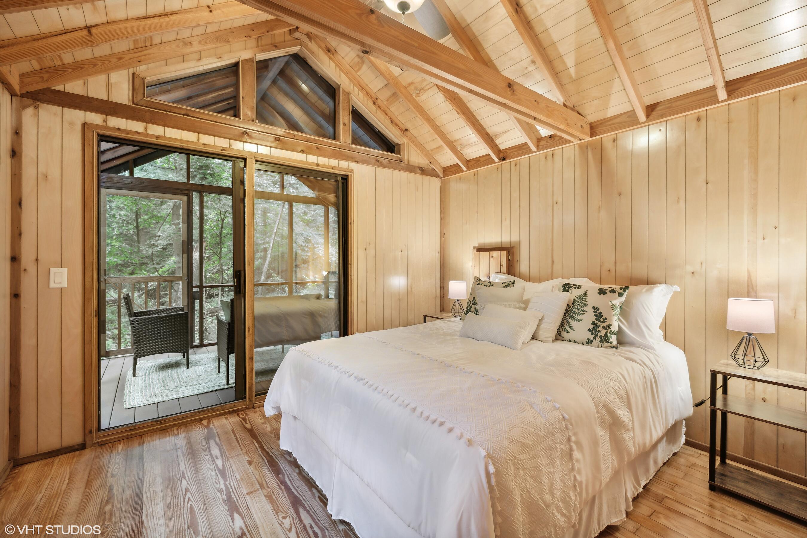 53 Tryon Farm Lane Michigan City, IN 46360 - Photo 13 of 30 a spacious bedroom with a bed and a large window