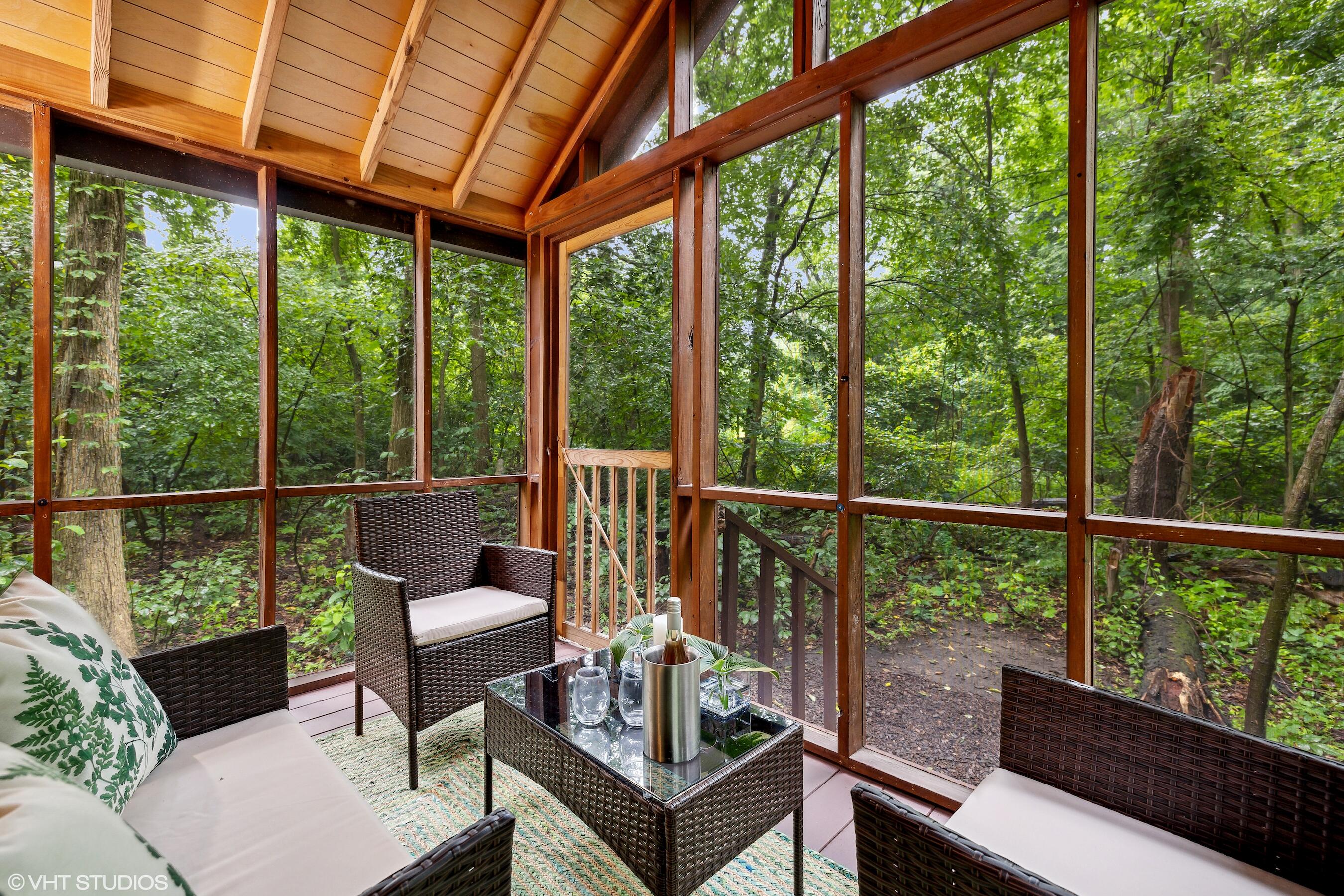 53 Tryon Farm Lane Michigan City, IN 46360 - Photo 15 of 30 a view of a chair and tables in the balcony