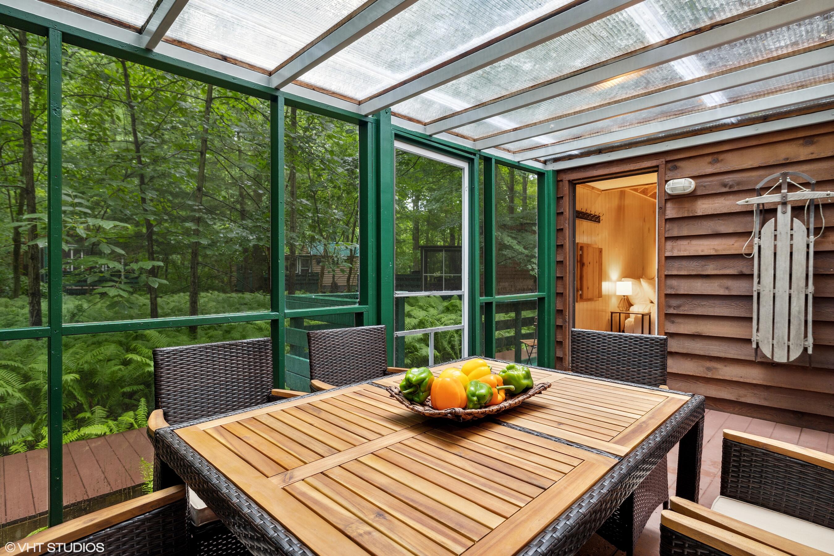 53 Tryon Farm Lane Michigan City, IN 46360 - Photo 18 of 30 a view of a patio with a table chairs and a table