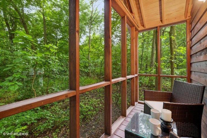 53 Tryon Farm Lane Michigan City, IN 46360 - Photo 21 of 30 a view of a chair and tables in the balcony