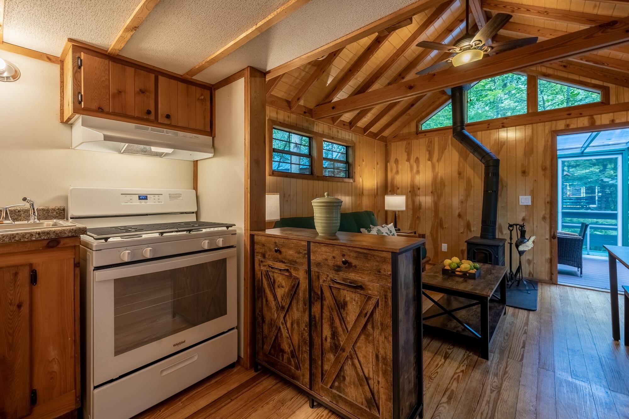 53 Tryon Farm Lane Michigan City, IN 46360 - Photo 7 of 30 a kitchen with stainless steel appliances granite countertop a stove a sink and a microwave