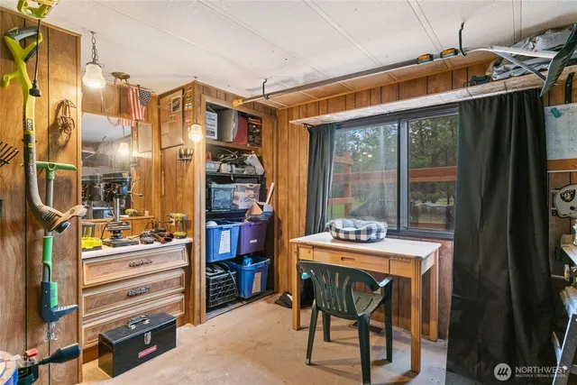 a view of kitchen and living room with furniture
