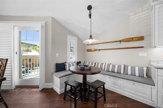 a bathroom with a granite countertop sink mirror and shower
