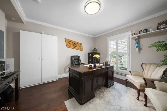 a view of a chairs and table in a patio
