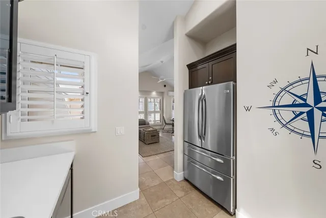 an aerial view of a house with outdoor space