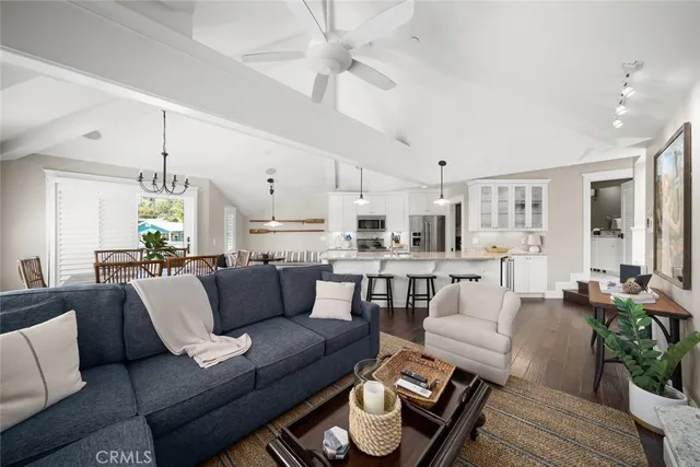 a kitchen with a sink and a stove top oven