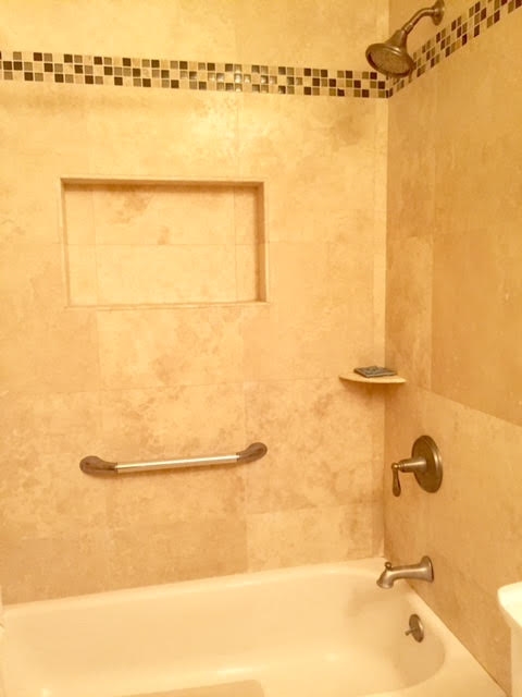 480 Kenolio Road, Unit 26105 Kihei, HI 96753 - Photo 13 of 16 a bathroom with a shower