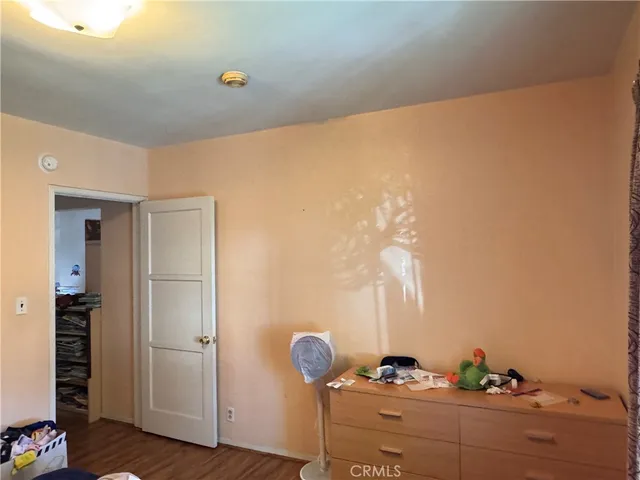 a view of workspace with hardwood floor