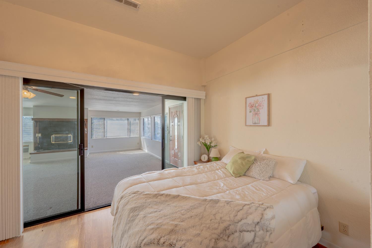 5912 Old Gulch Road San Andreas, CA 95249 - Photo 17 of 71 a bedroom with a bed and a mirror