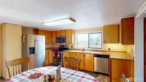 a bed room with a bed furniture and a window