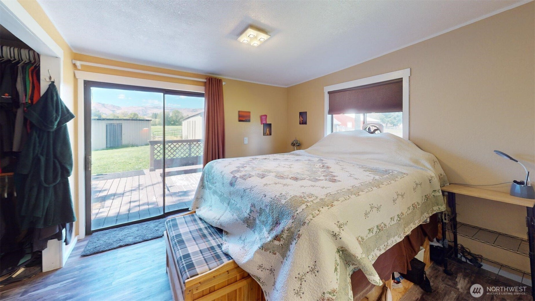 79 Duck Lake Road Omak, WA 98841 - Photo 12 of 40 a bedroom with a bed and a large window