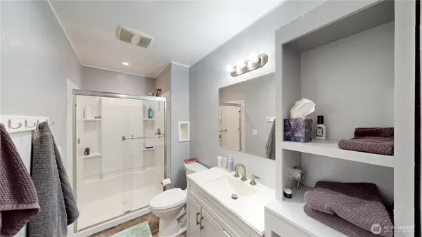 a bathroom with a sink and mirror