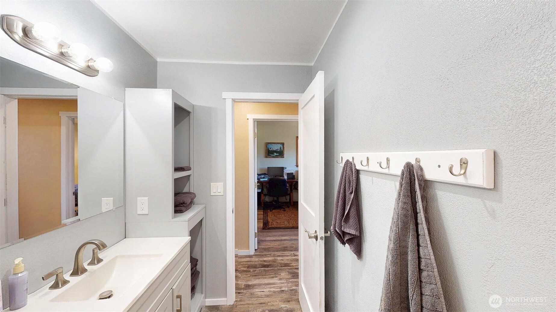 79 Duck Lake Road Omak, WA 98841 - Photo 25 of 40 a bathroom with a sink and mirror
