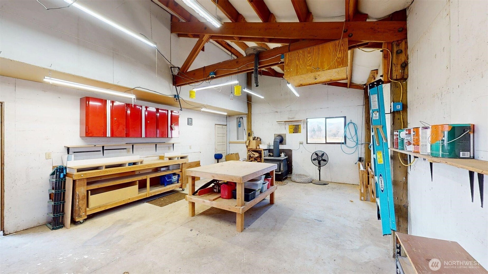 79 Duck Lake Road Omak, WA 98841 - Photo 29 of 40 a room with furniture and a window