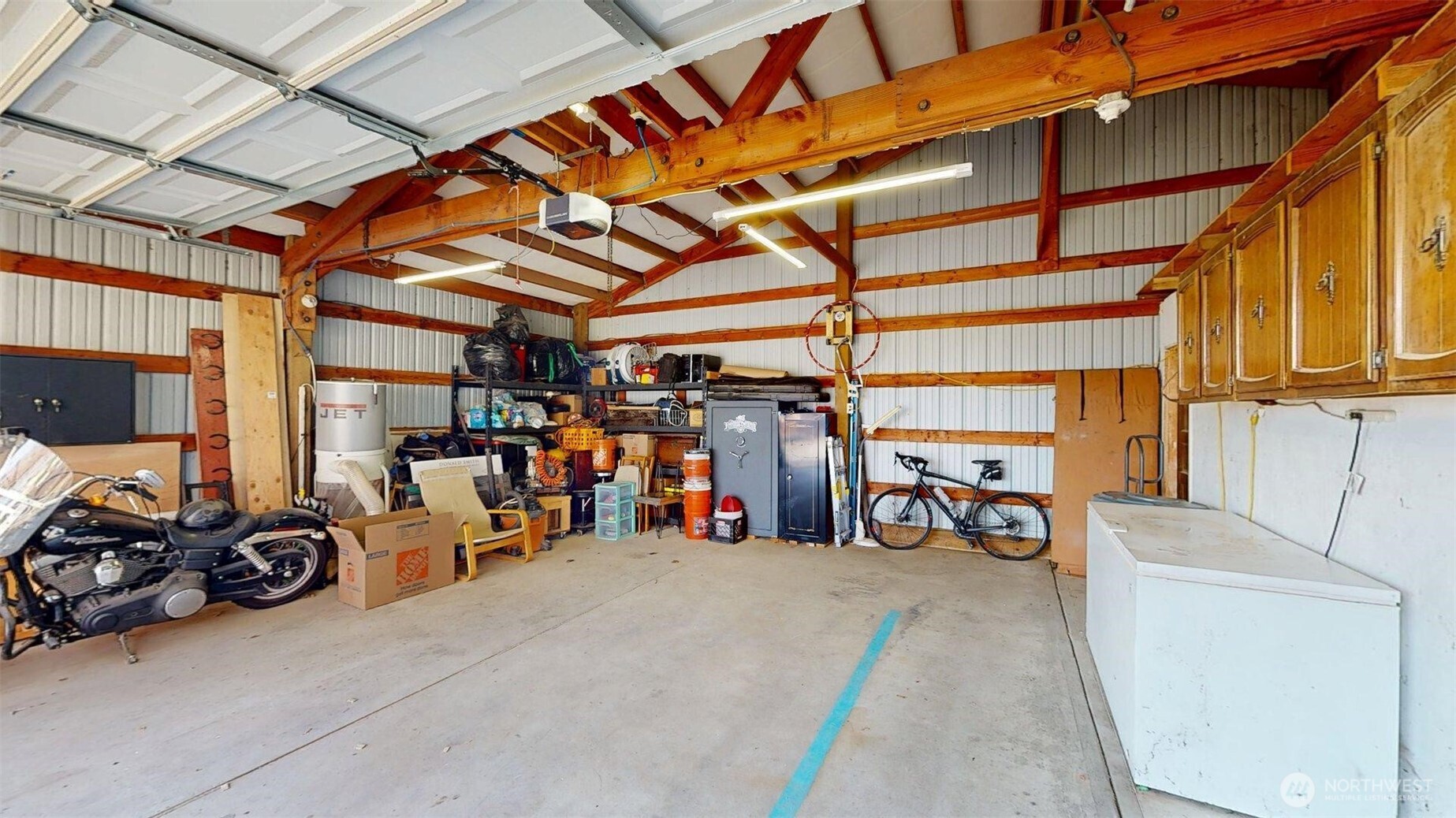 79 Duck Lake Road Omak, WA 98841 - Photo 30 of 40 a view of a storage room with gym equipment