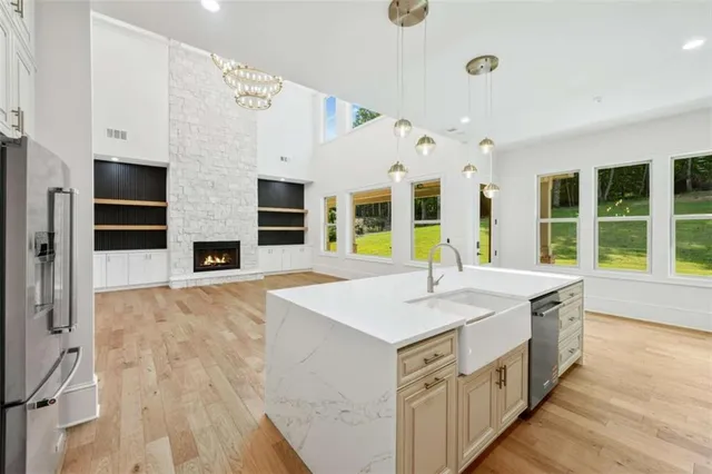 a view of an empty room with windows