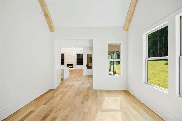 a bathroom with a bathtub and shower