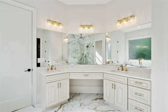 a spacious bathroom with a shower sink double and mirror