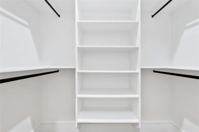 a view of a house with backyard and porch