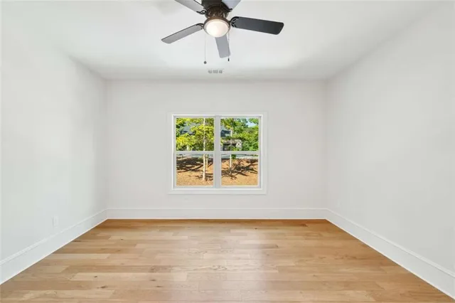 a view of a swimming pool with a backyard