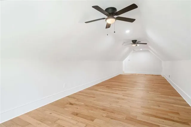a view of backyard with swimming pool and outdoor seating