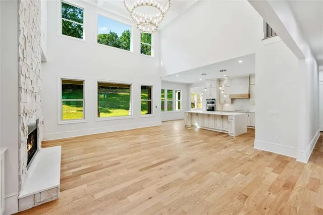 a kitchen with a sink a counter top space stainless steel appliances and cabinets
