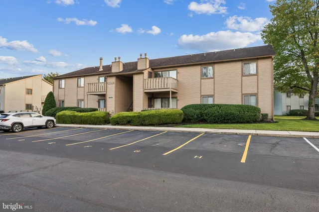 a view of a building with a street