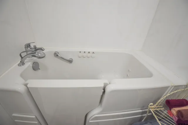 a bathroom with a bathtub