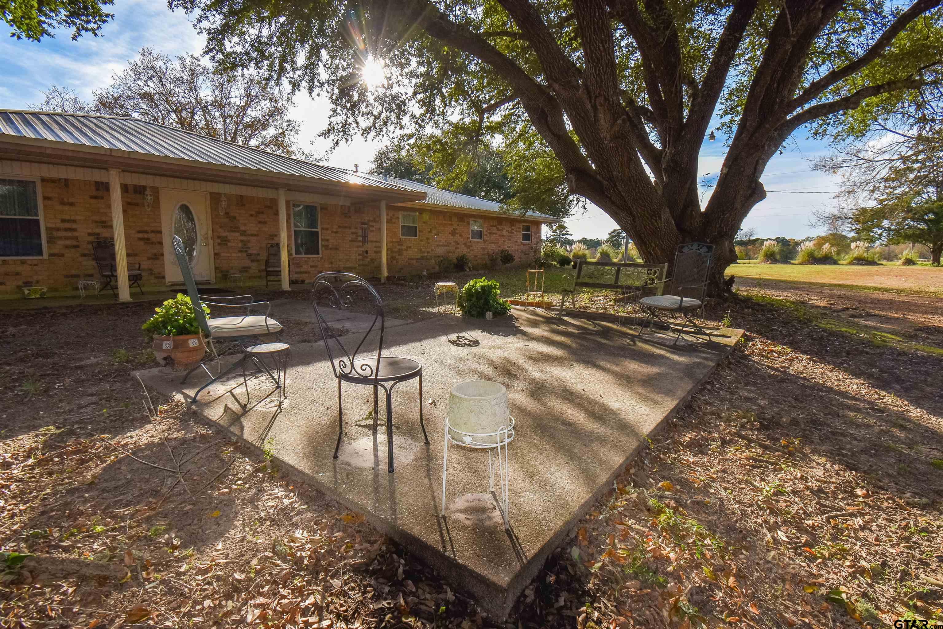 355 West Sugar Hill Road Reklaw, TX 75784 - Photo 3 of 38 a view of outdoor space yard and patio