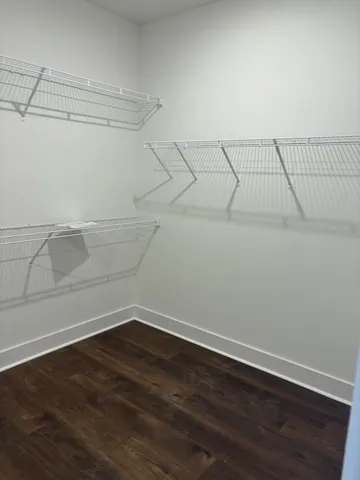 a view of a room with racks on the wall