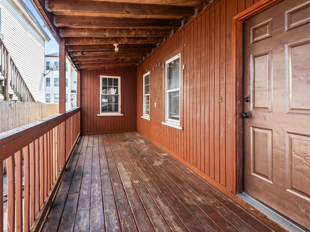549 Cambridge Street Worcester, MA 01610 - Photo 20 of 22 a view of porch with wooden floor