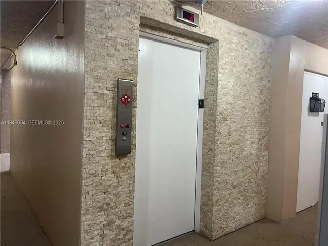 a view of a swimming pool with a garden