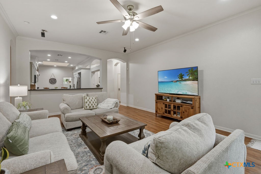 3306 Spring Canyon Road Belton, TX 76513 - Photo 13 of 40 a living room with furniture and a flat screen tv