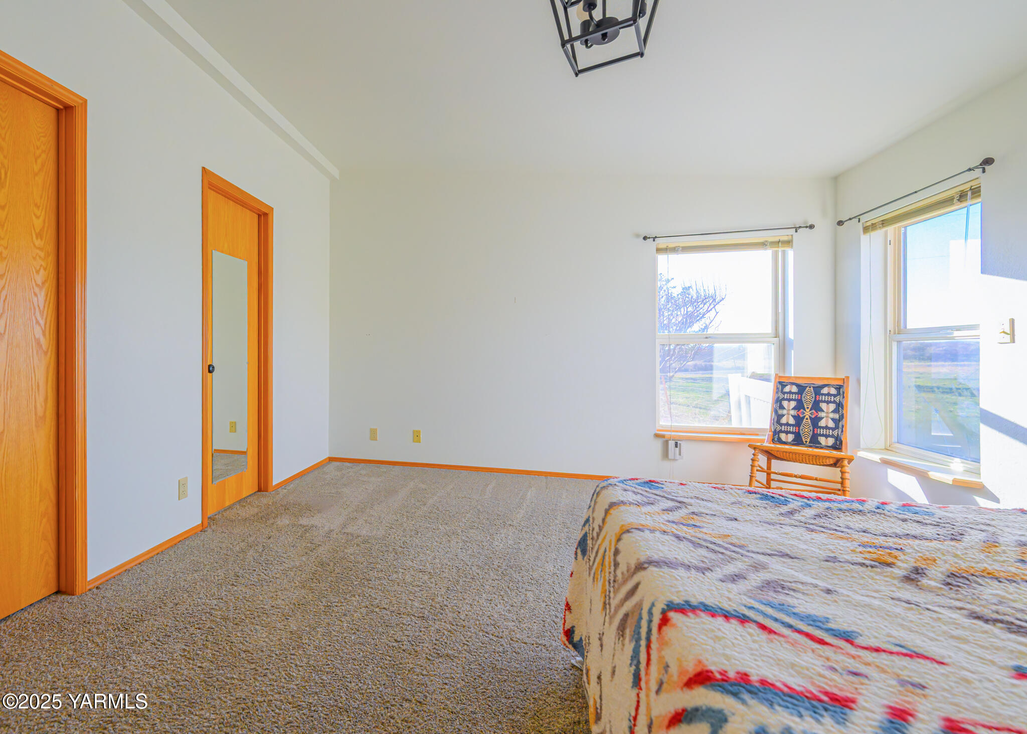 1421 Conrad Road Selah, WA 98942 - Photo 5 of 37 a bedroom with a bed and a window