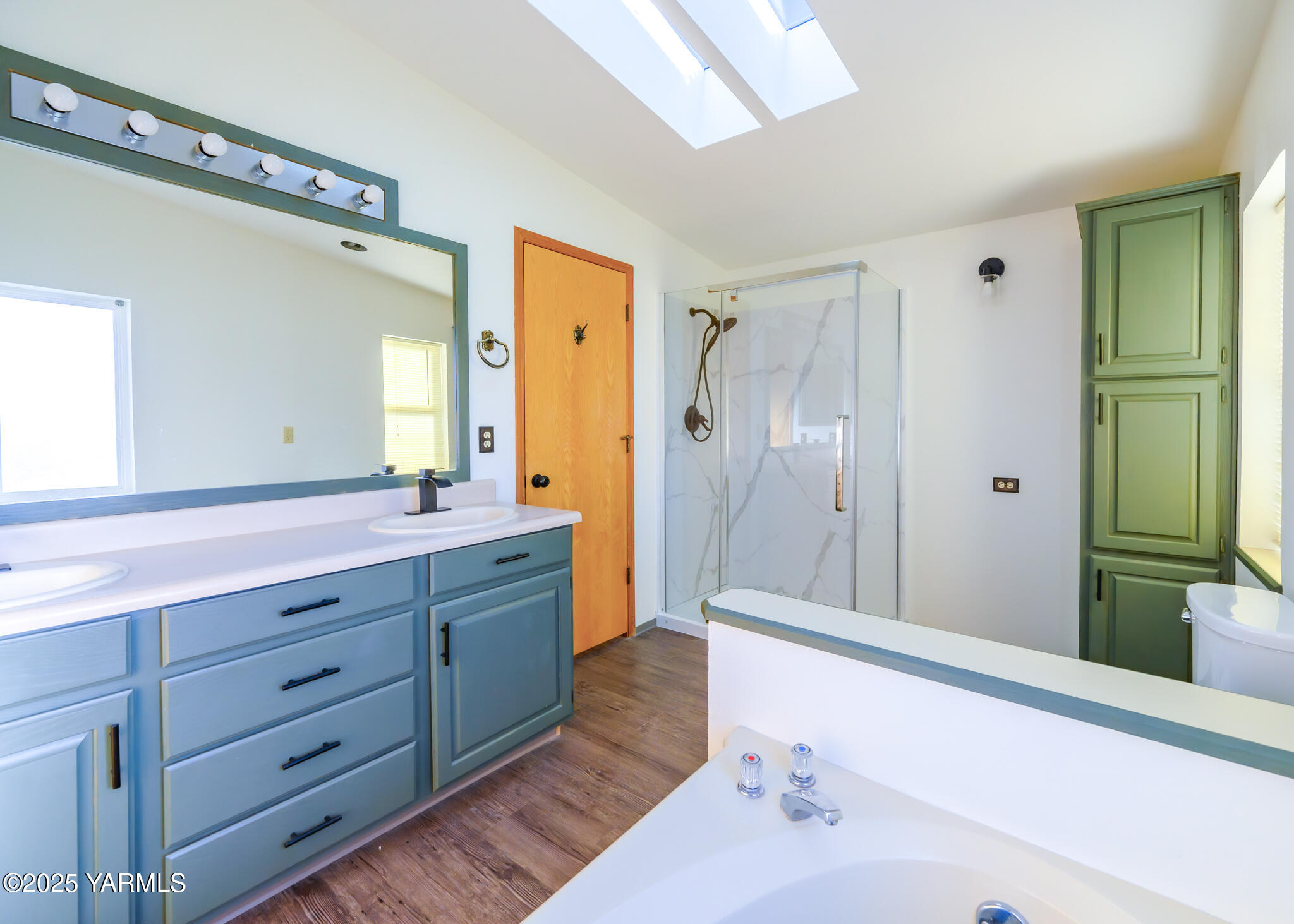 1421 Conrad Road Selah, WA 98942 - Photo 7 of 37 a bathroom with a granite countertop sink a mirror and a shower