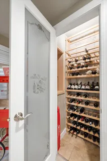 a view of walk in closet and window