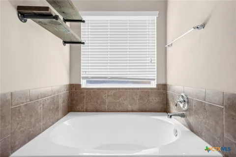 a bathroom with a bathtub