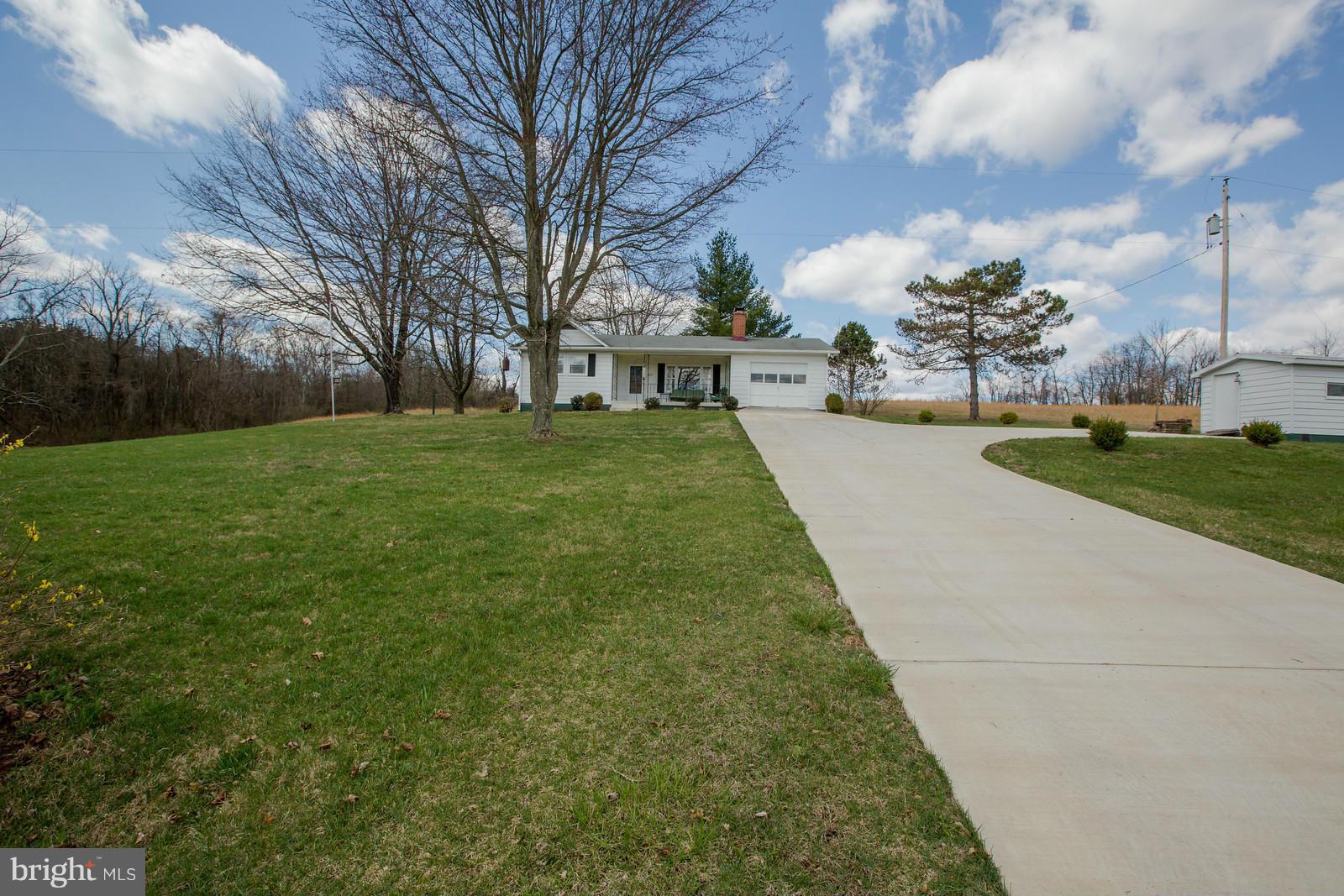 1047 New Hope Road Cross Junction, VA 22625 - Photo 2 of 27 a view of a backyard with green space
