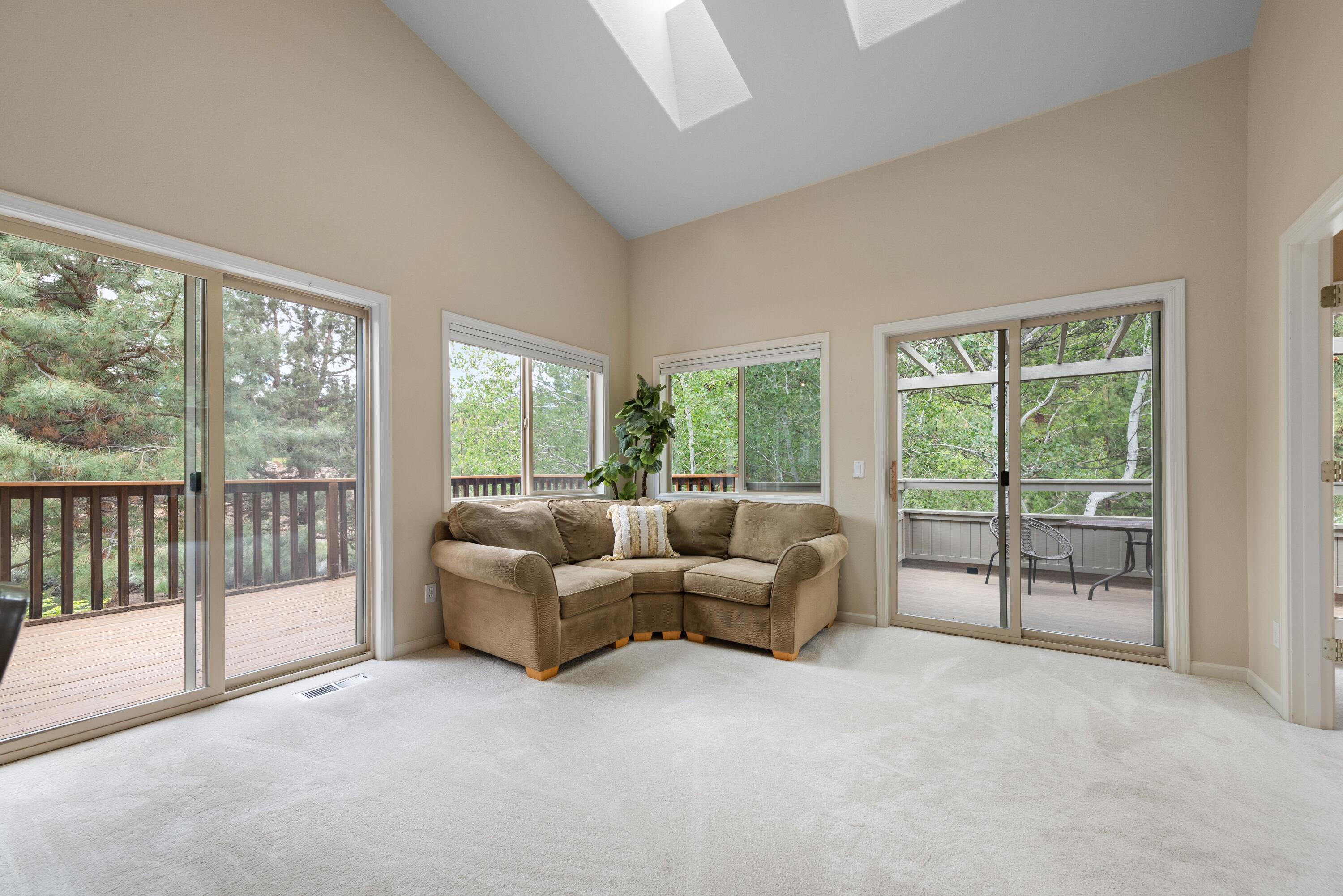 2255 Northwest Putnam Road Bend, OR 97703 - Photo 19 of 49 Family room has two sliding doors leading to the back and side decks.