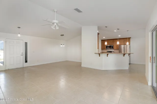 a view of a kitchen with a dishwasher cabinets and a kitchen