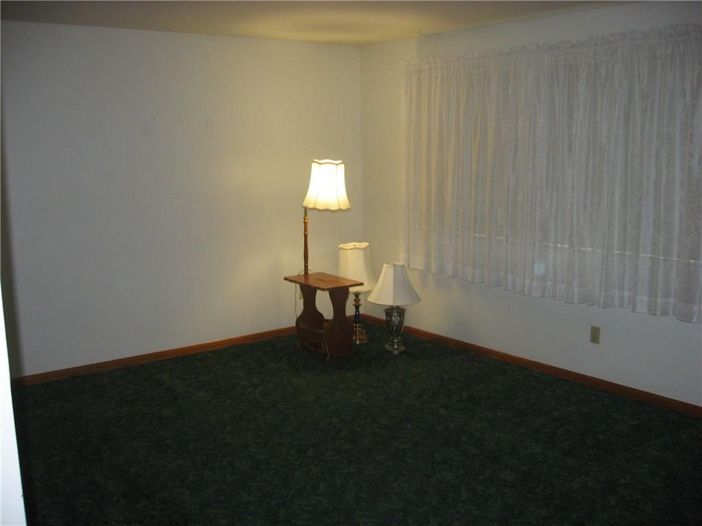 113 Locust Road Mount Pleasant, PA 15666 - Photo 8 of 14 Living Room currently carpeted, has hard wood underneath.