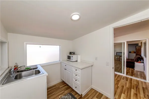 a room with cabinets and furniture