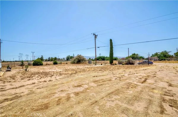 a view of a road with an ocean view
