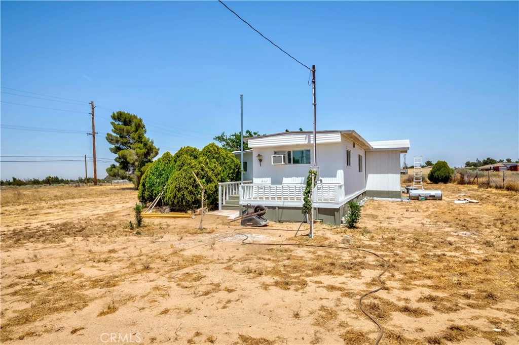 7127 Phelan Road Phelan, CA 92371 - Photo 8 of 44 a house with a yard