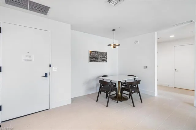 a view of a dining room with furniture