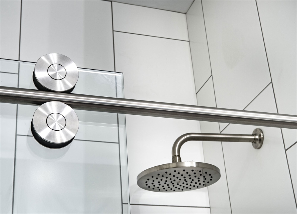 72 Flint Street, Unit 1406 Salem, MA 01970 - Photo 6 of 17 a close view of a stove top oven and cabinets